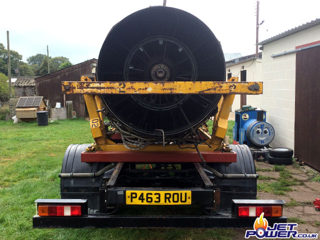 A rear view of the engine mounted on to the lorry.