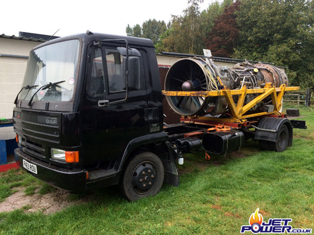 Front side view of the engine and lorry.